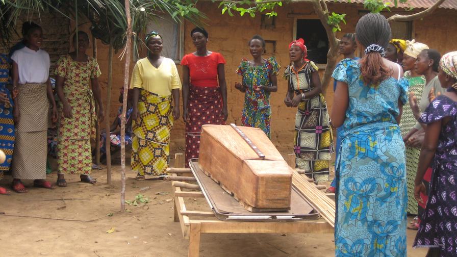 Honoring relatives with wooden caskets