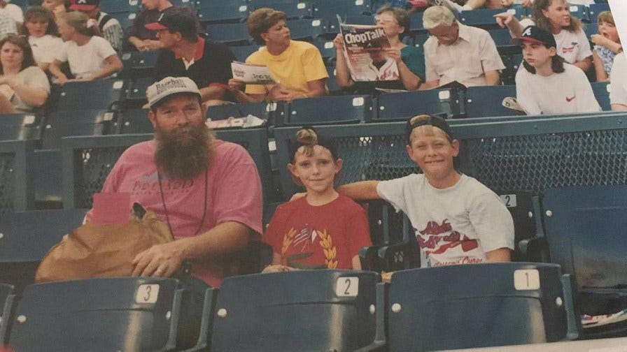 Chris and Tom Young with Cody